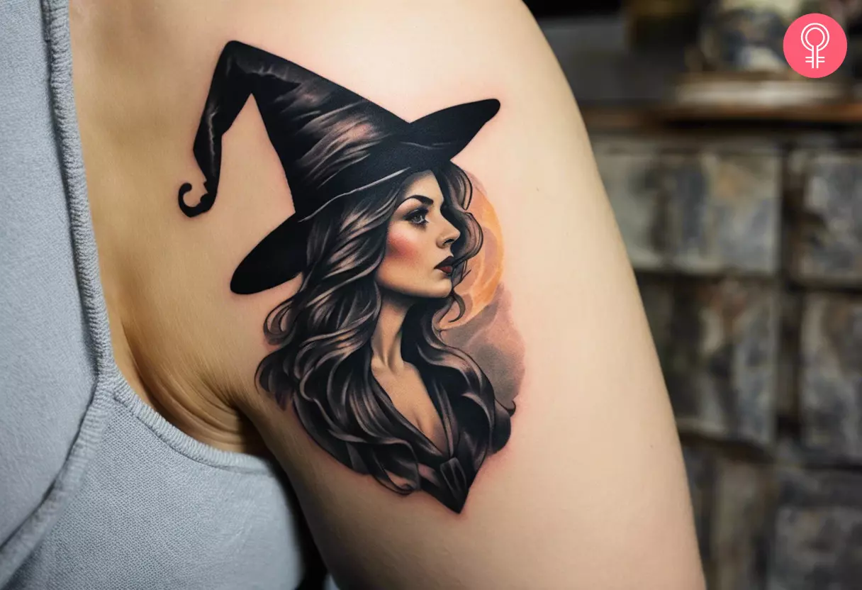 A witch tattoo on the upper arm