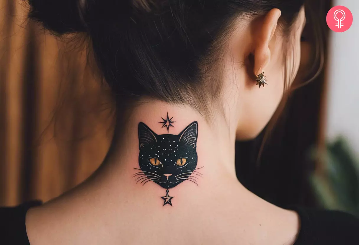 A witchy cat tattoo on the nape of the neck