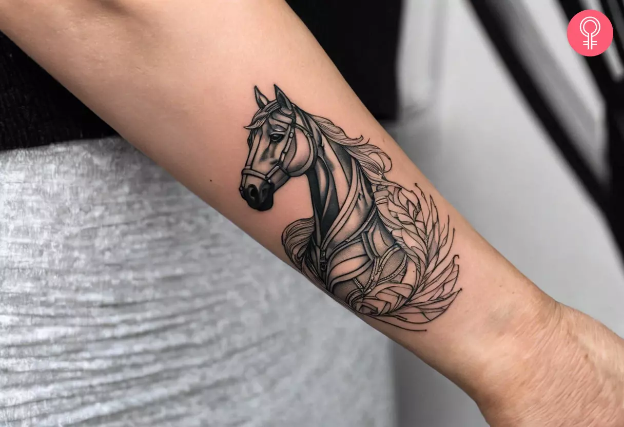 Woman with a minimalistic horse tattoo on her forearm