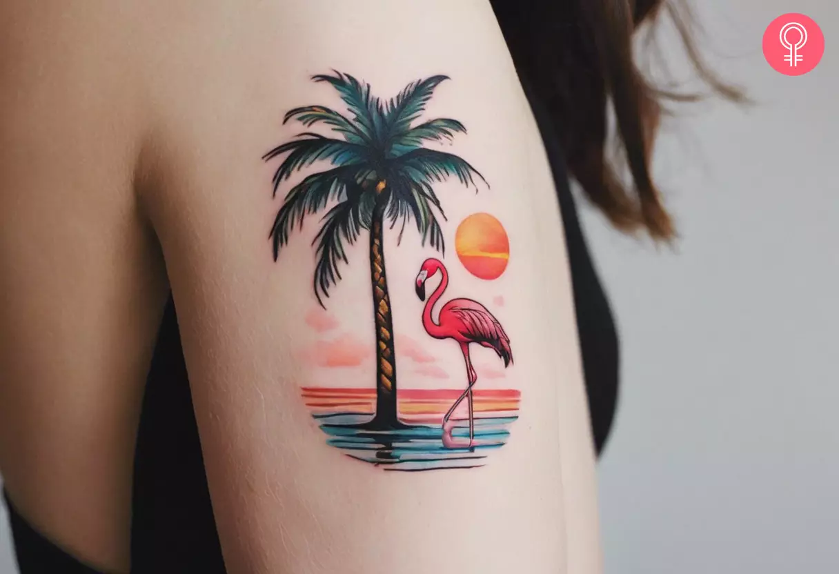 Woman with a tattoo of a flamingo and palm tree