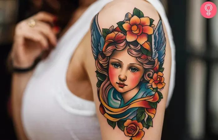 Woman with a traditional cherub tattoo