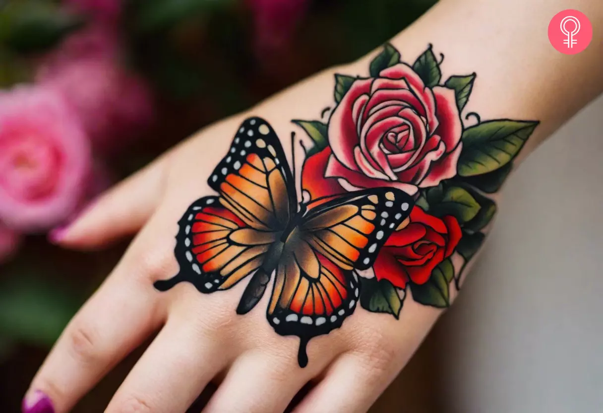 Woman with butterfly and flower hand tattoo