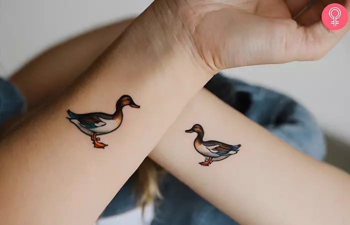 Woman with matching duck tattoo