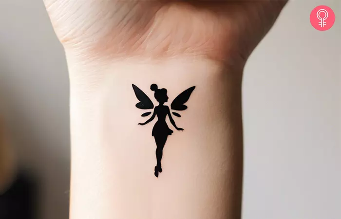 A small Disney tattoo on a woman’s wrist