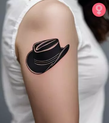 Cowboy tattoo on the upper arm