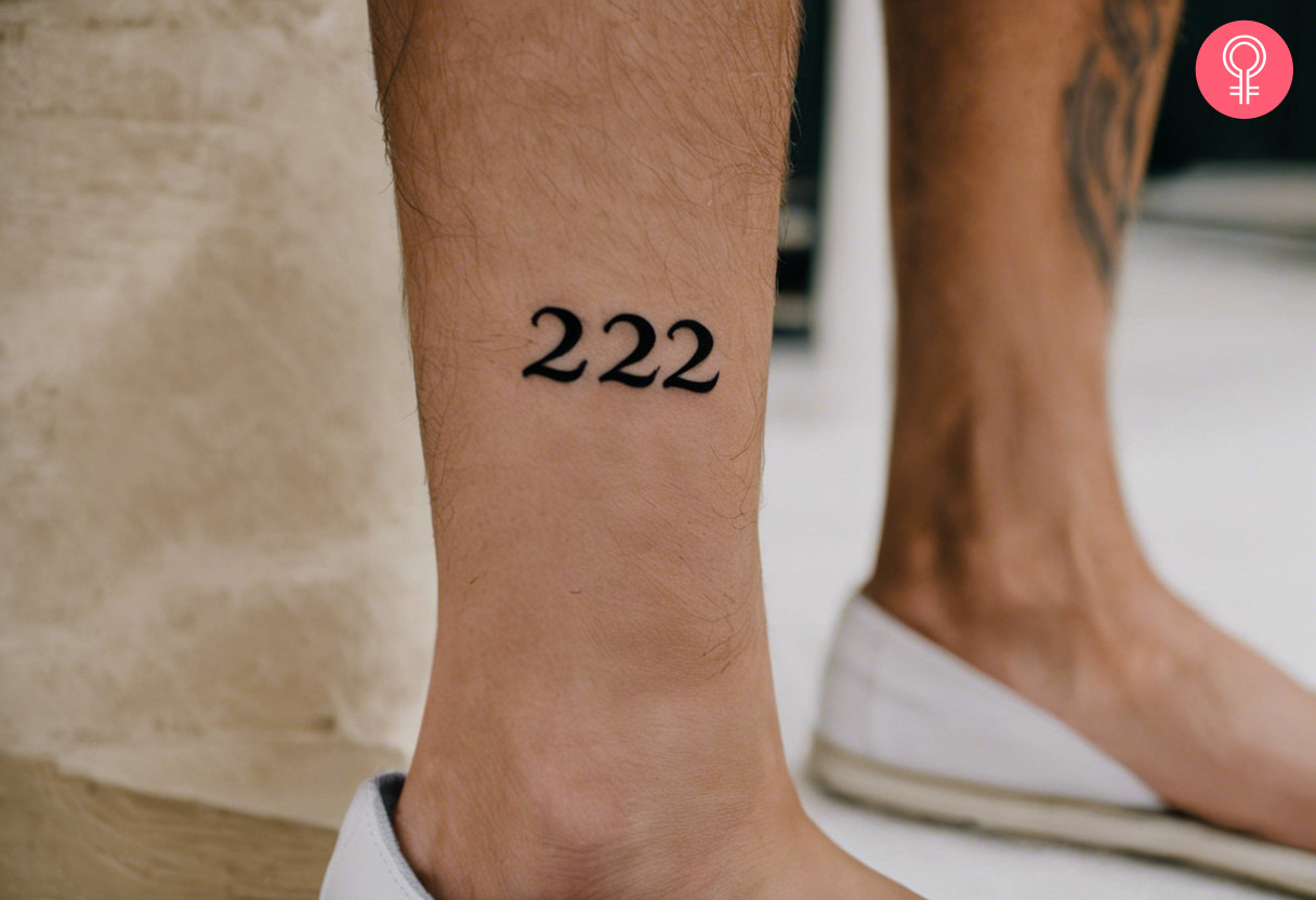 A 222 tattoo on a man’s leg