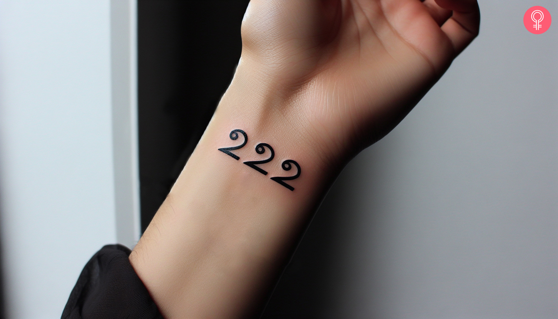 A 222 wrist tattoo on a woman’s wrist
