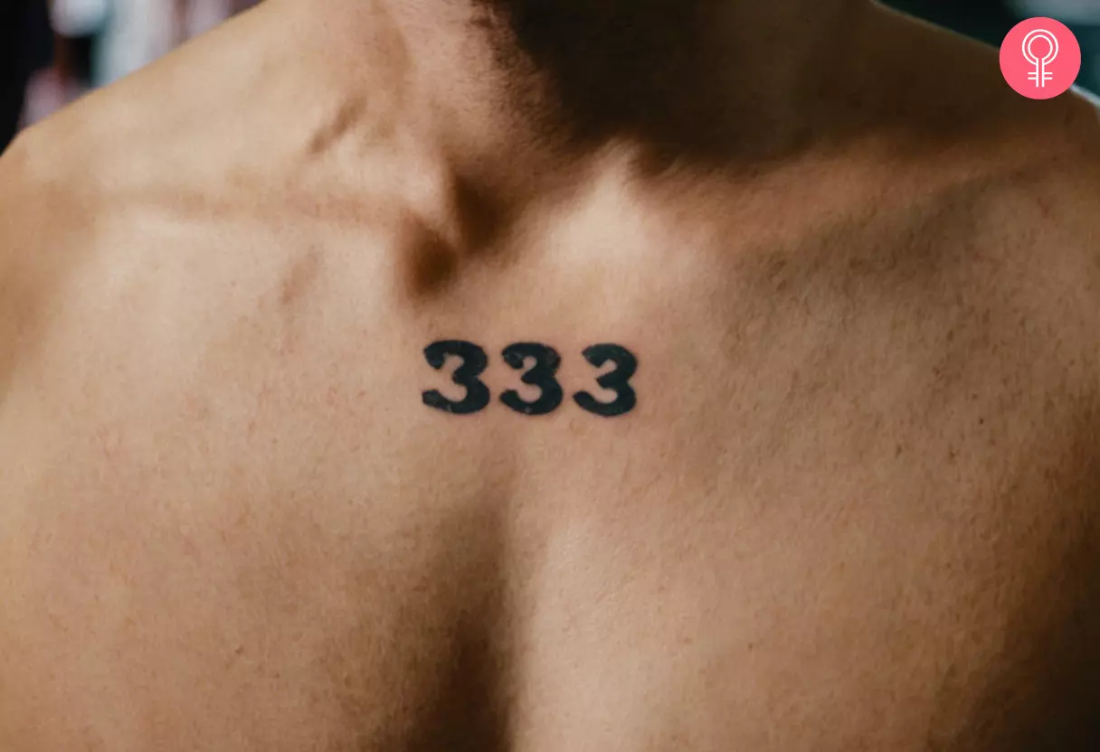 Man with 333 chest tattoo