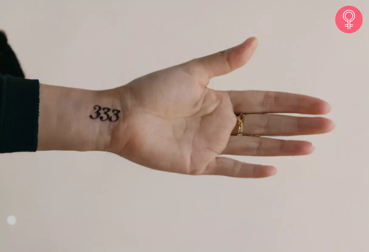 Woman with 333 wrist tattoo