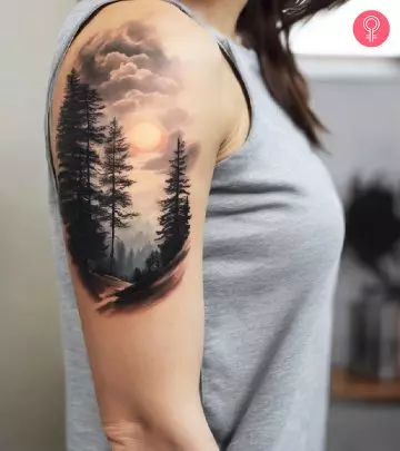 Woman with a Mother Nature tattoo on the upper arm