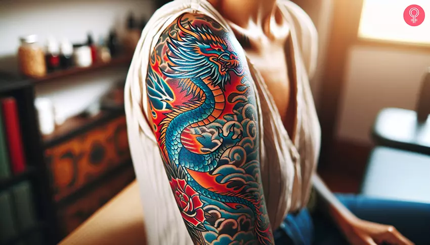 A beautiful neo-traditional dragon tattoo on the upper arm