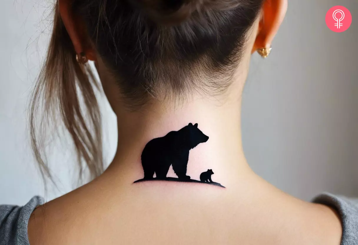 A black bear silhouette tattoo showing a mama and baby black bear