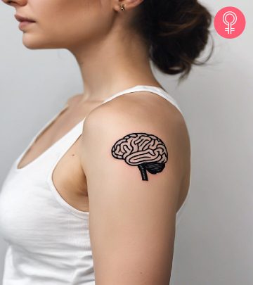 A balance tattoo on a woman’s arm