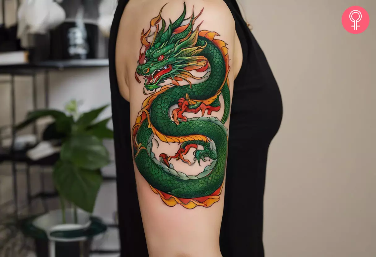 A colorful Shenron dragon tattoo on the upper arm