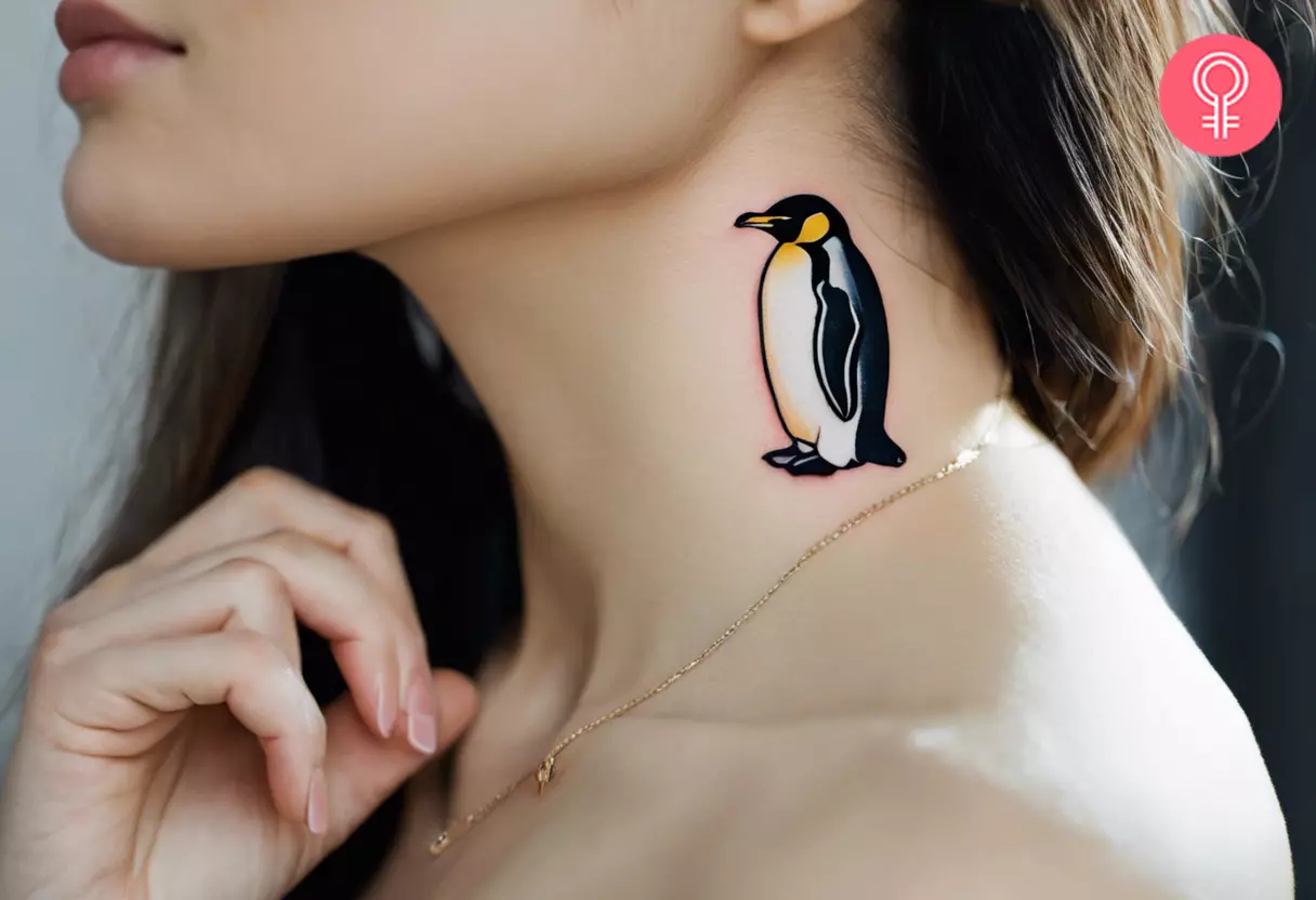 A cute black and gray penguin resilience tattoo