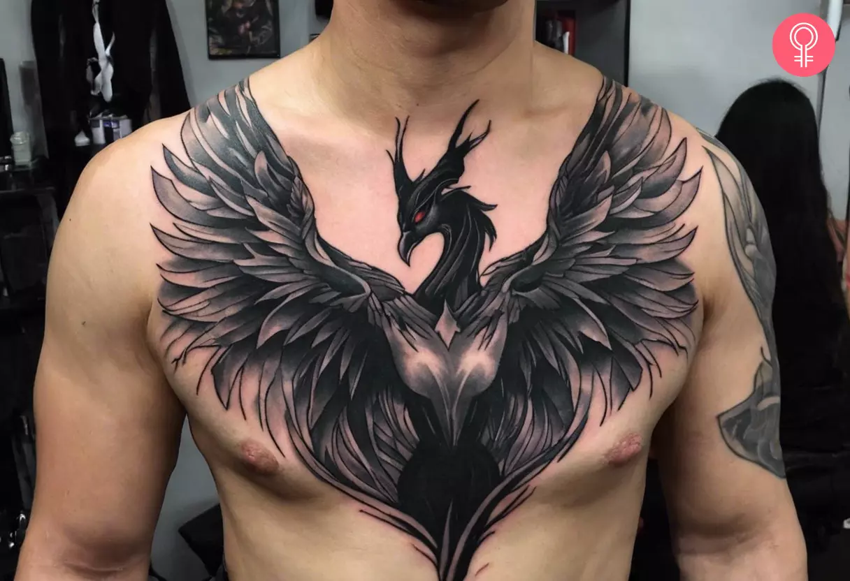 A man wearing a Maleficent phoenix tattoo on the chest