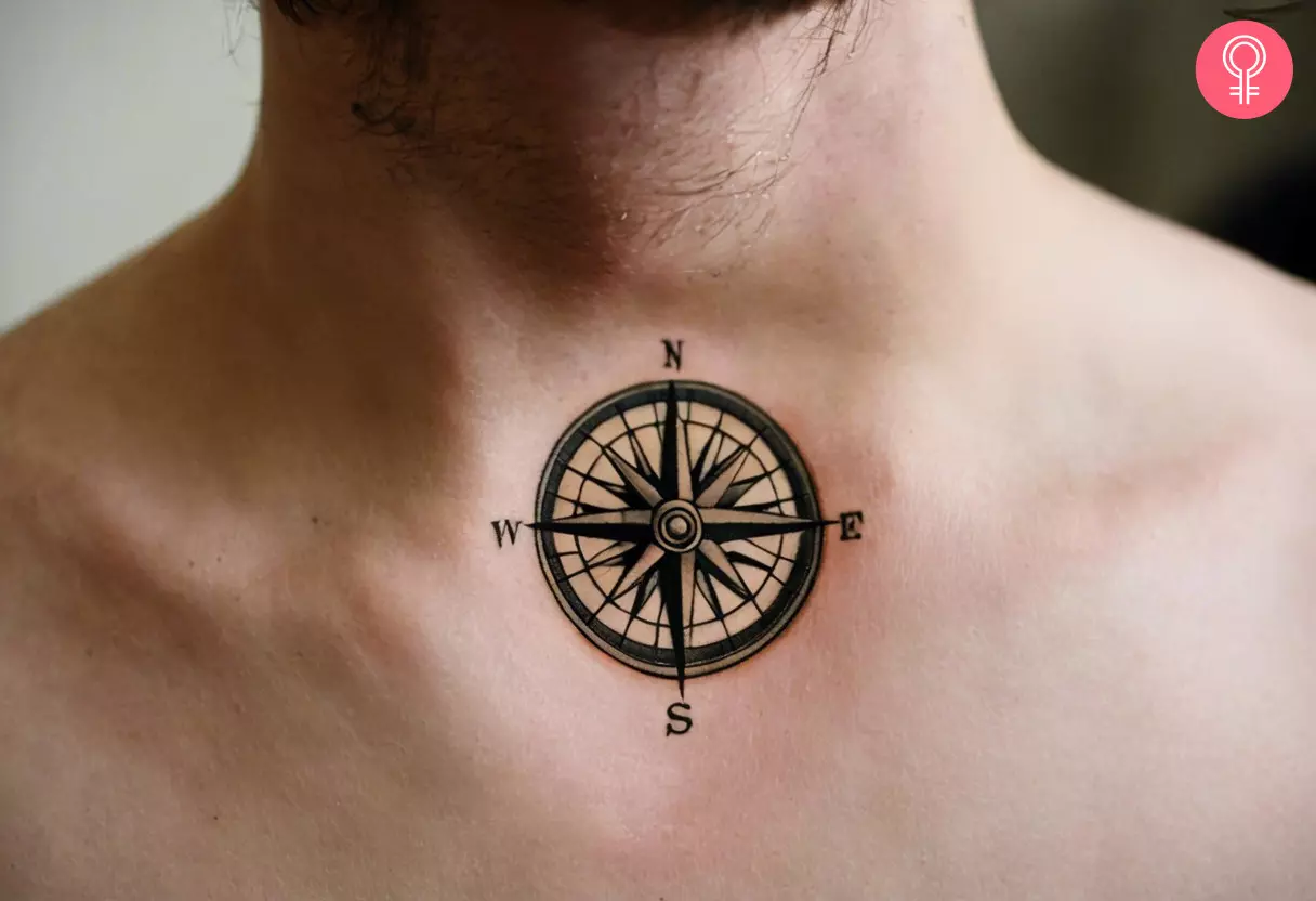 A man with a compass neck tattoo on the front neck