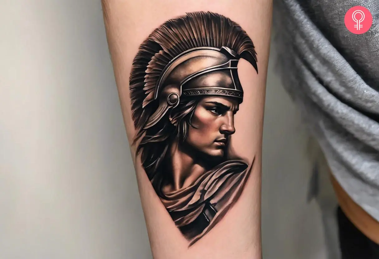 A man with an Achilles tattoo on his forearm