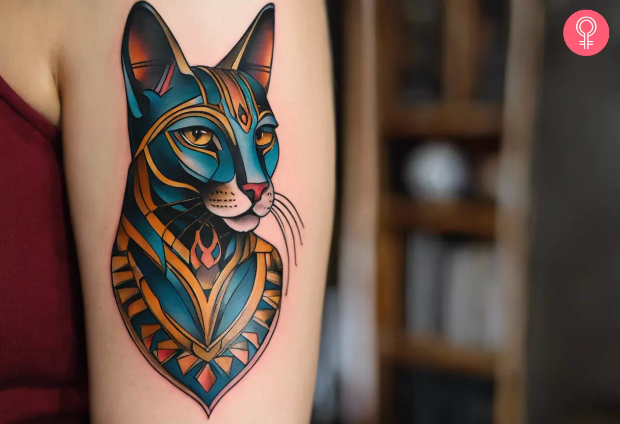 A new school Bastet tattoo on the upper arm