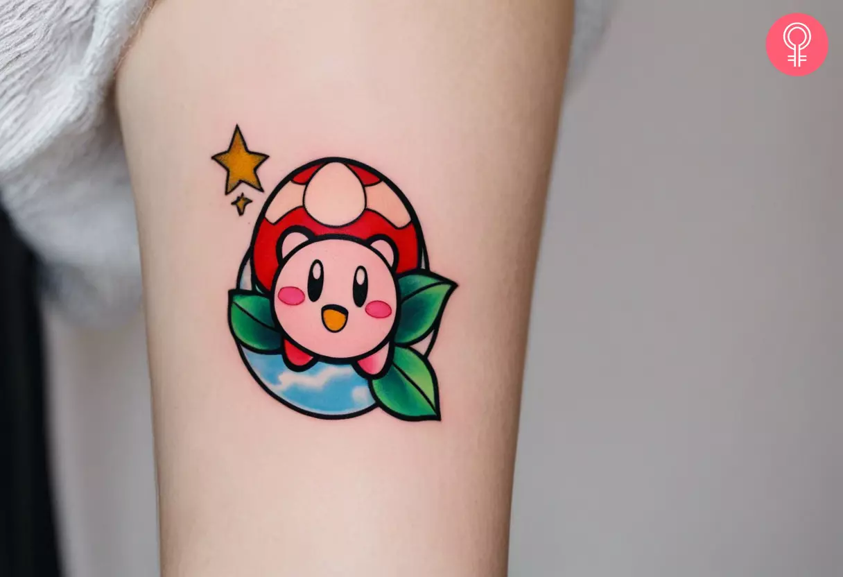 A small colorful Kirby tattoo on the arm