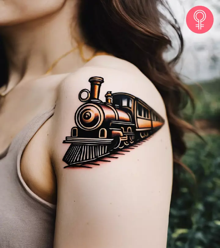 A traditional train tattoo on the upper arm