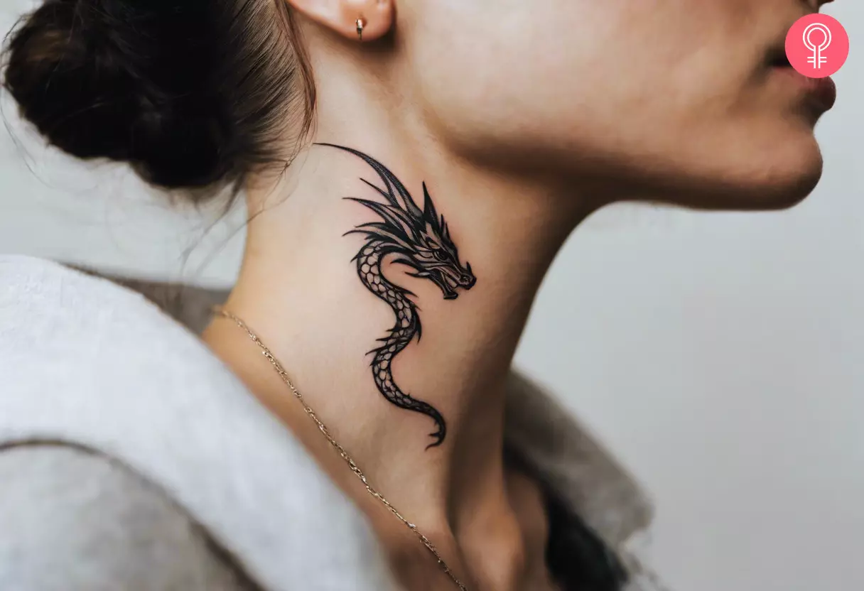 A woman with a black dragon neck tattoo