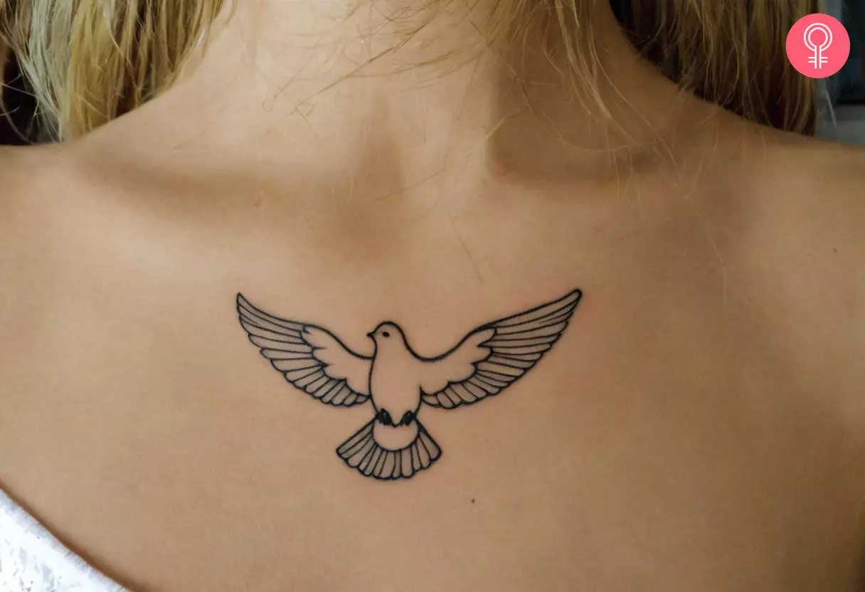 A woman with a freedom dove tattoo near the collarbone