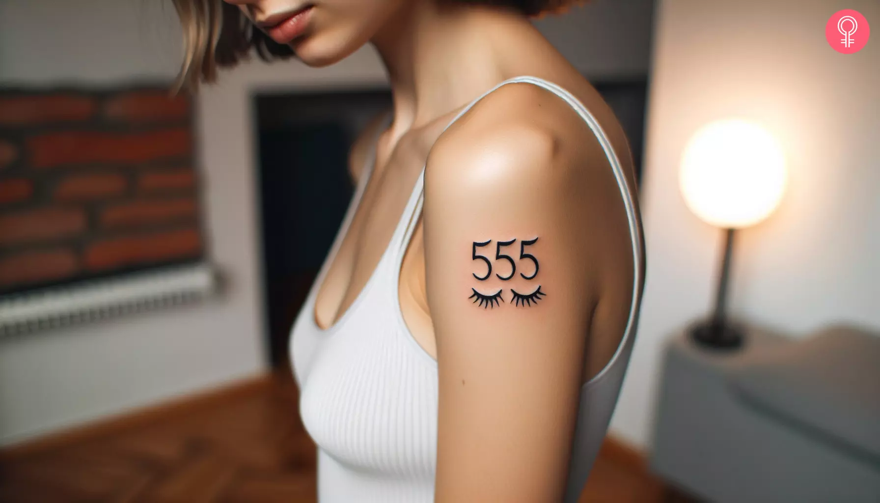 A woman with a minimalist 555 tattoo on her upper arm