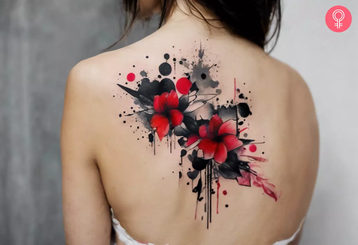 Abstract trash polka tattoo on the back of a woman