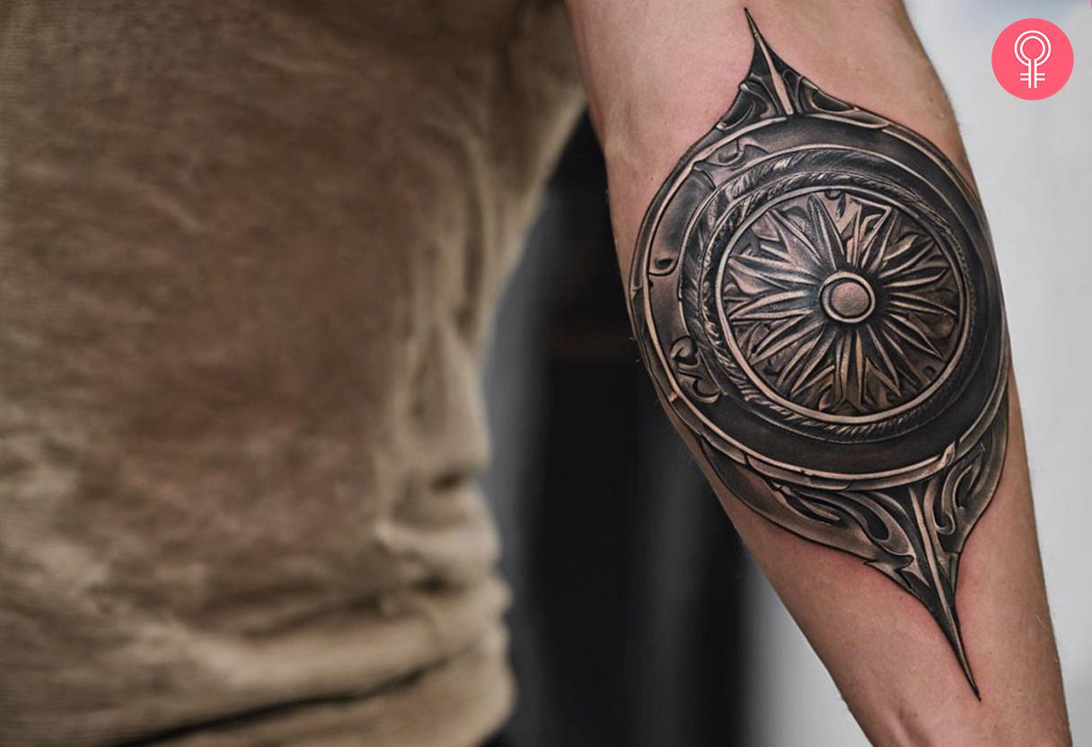 Achilles shield tattoo on the forearm