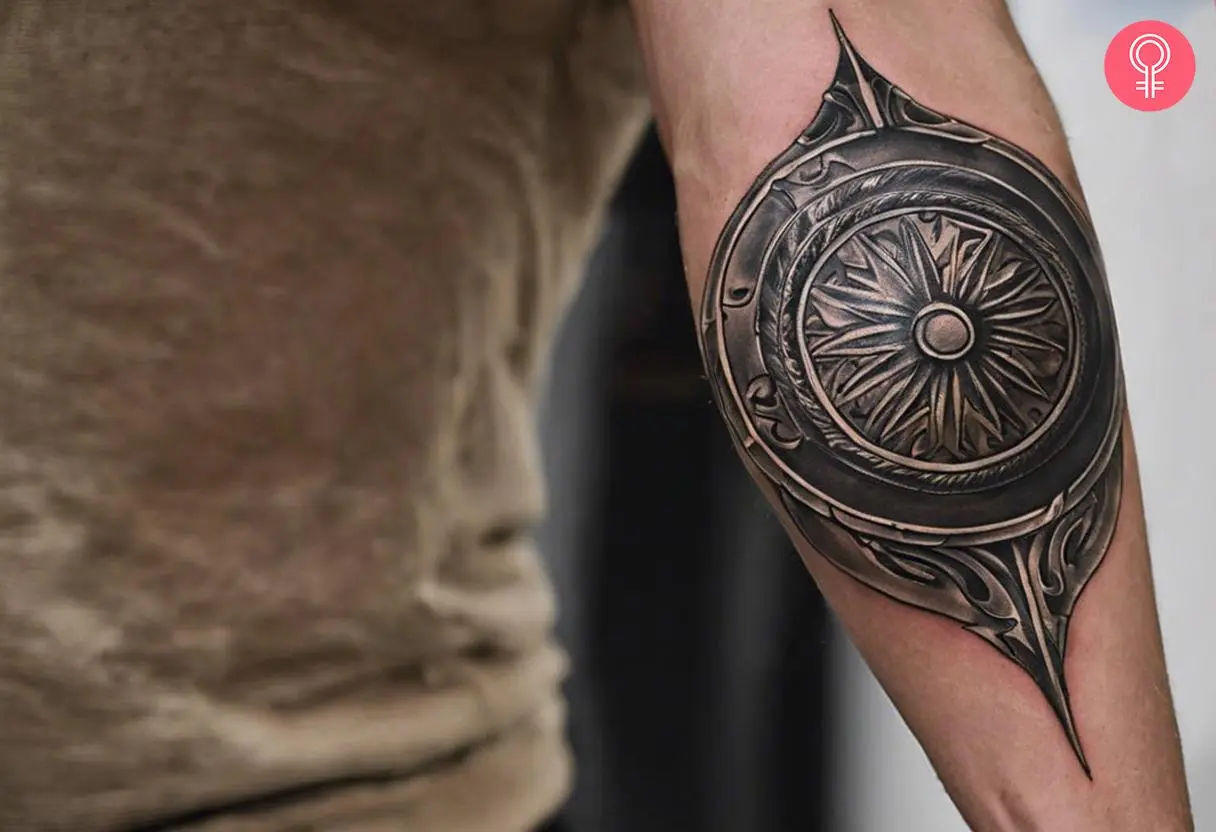 Achilles shield tattoo on the forearm