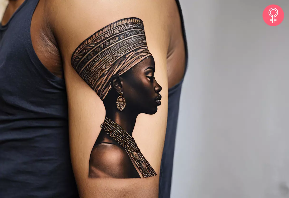 An African queen tattoo on a woman’s upper arm