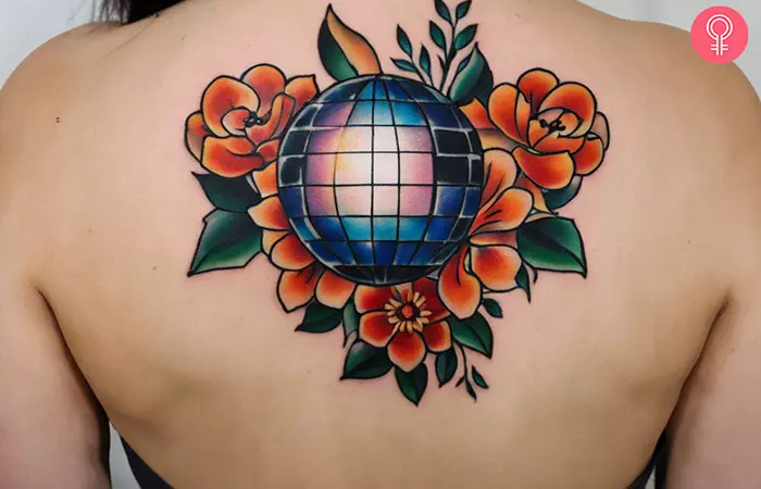 An American traditional disco ball tattoo on the back