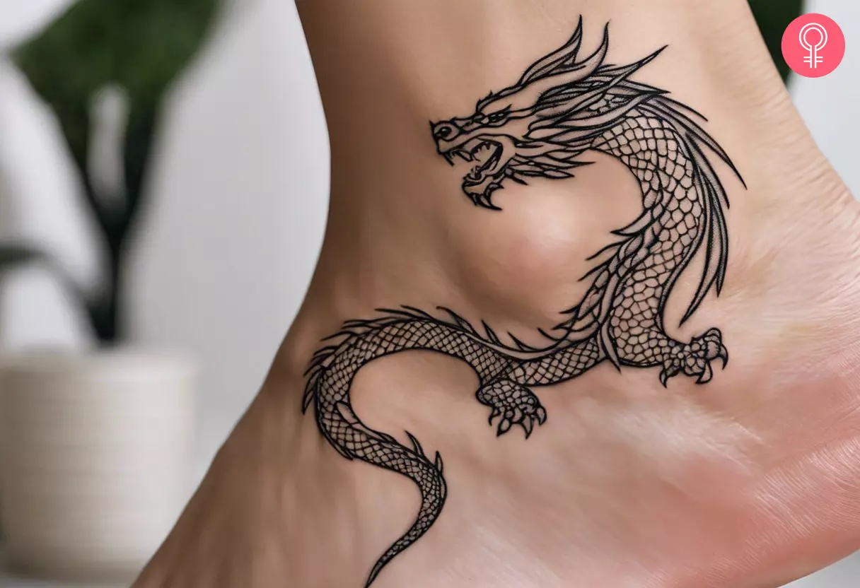 An outline dragon tattoo on the foot