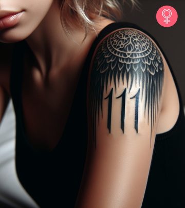 Woman with a guardian angel tattoo on the upper arm