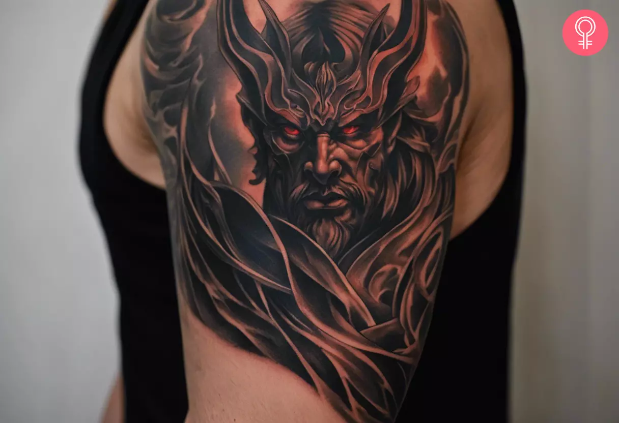 Archdemon tattoo on the upper arm