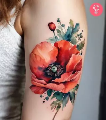 A woman with a chrysanthemum flower tattoo on her upper arm