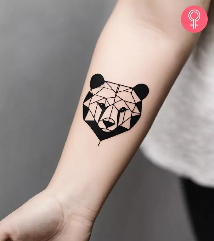 Black bear tattoo on the forearm
