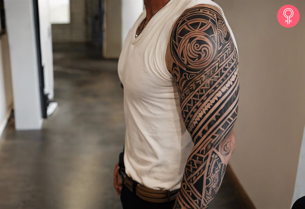 Black maori tattoo on the sleeve of a man