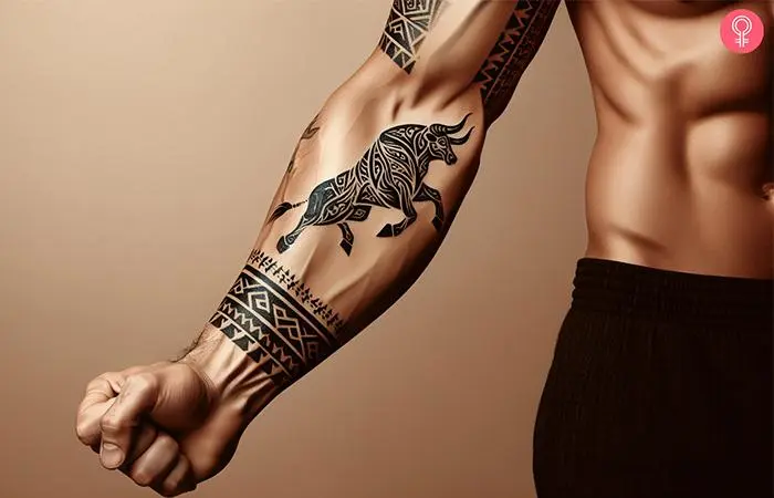 A man with a bull tattoo on his forearm