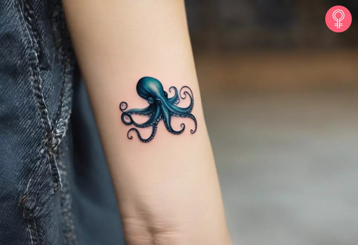 A woman with a dark micro-realism octopus tattoo