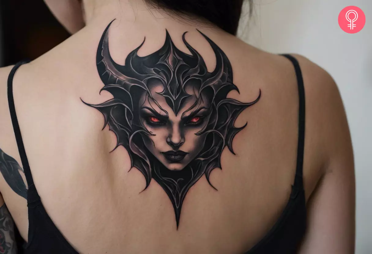 Dark evil demon tattoo on the back