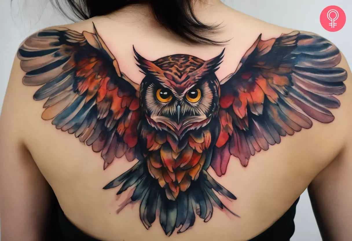 Demon owl tattoo on the back