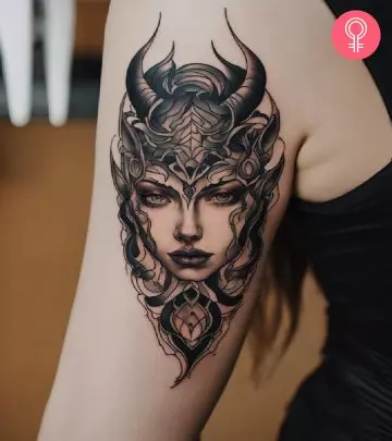 A pentagram tattoo on the arm
