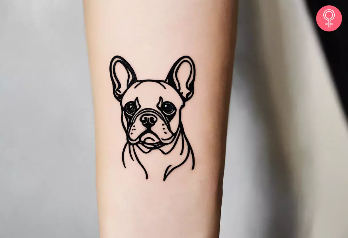 A French bulldog outline tattoo on the forearm