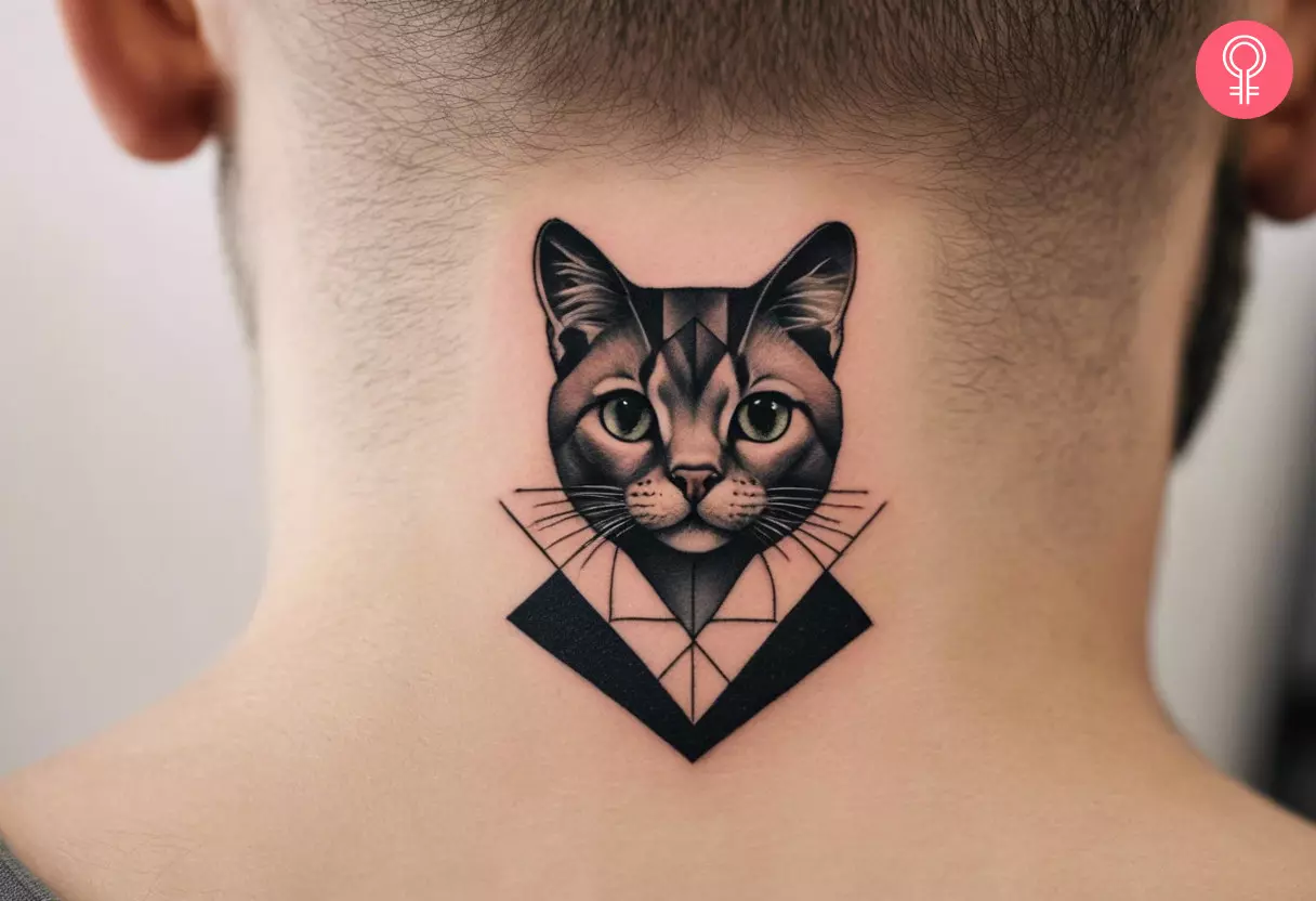 A man with a geometric micro-realism cat tattoo on his nape