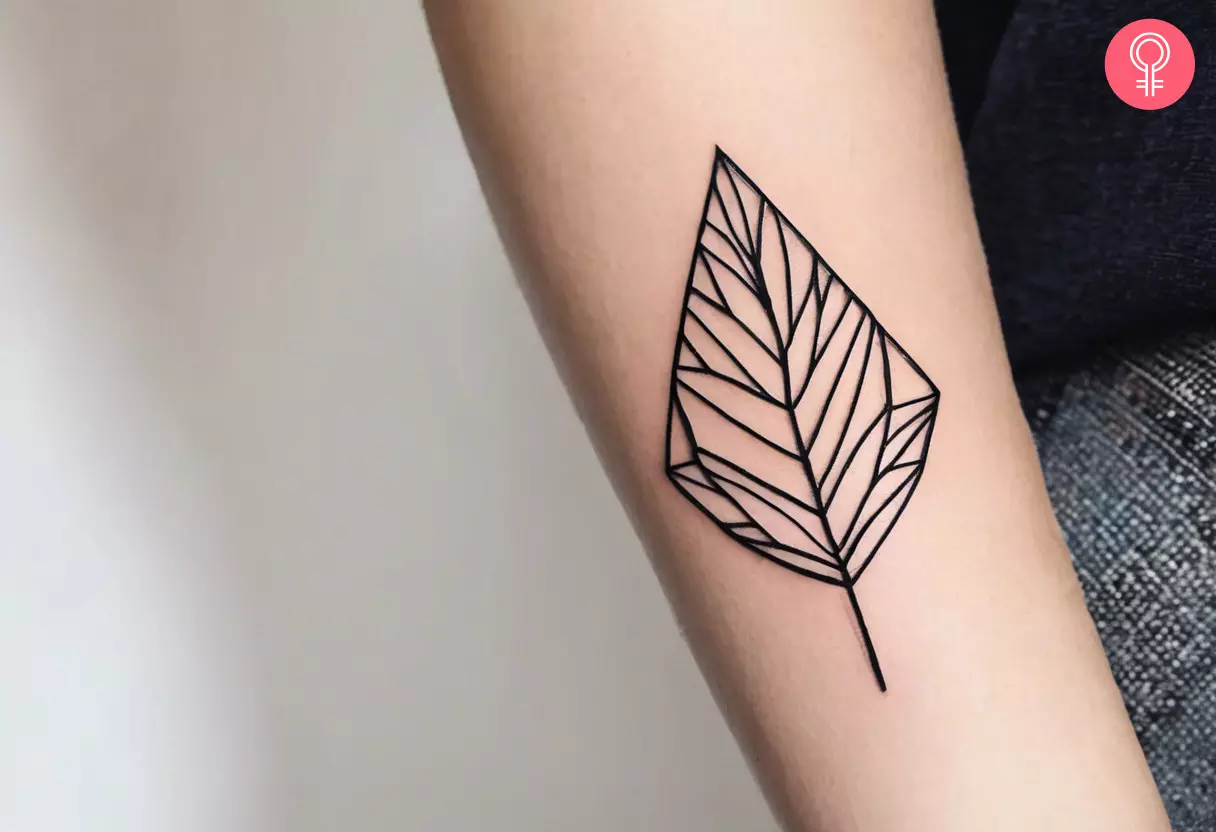 Geometric leaf tattoo on the arm