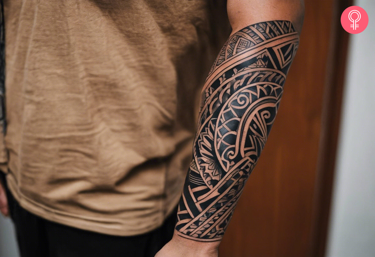 Geometric maori forearm tattoo on a woman