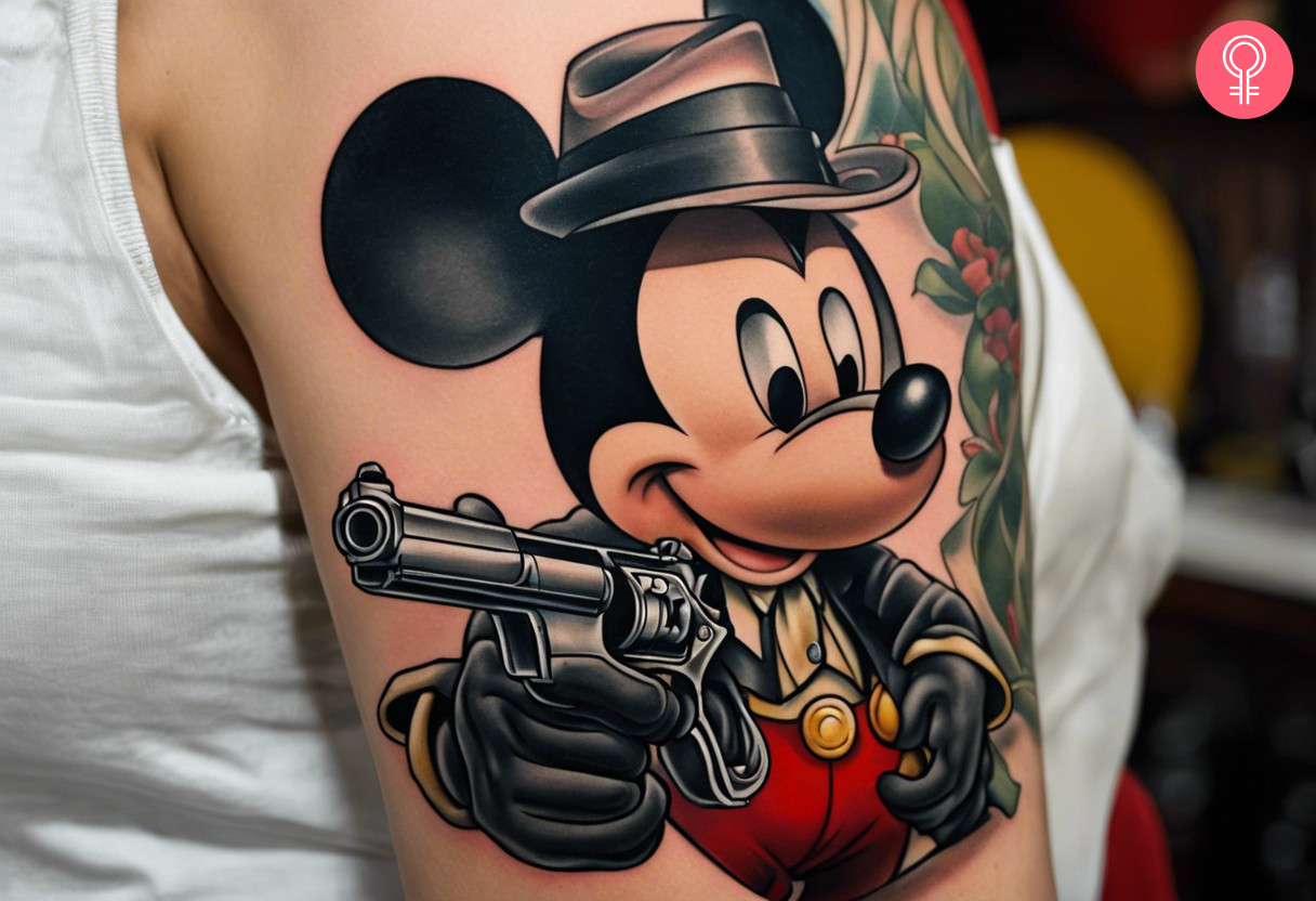Hood gangster Mickey Mouse tattoo on the upper arm