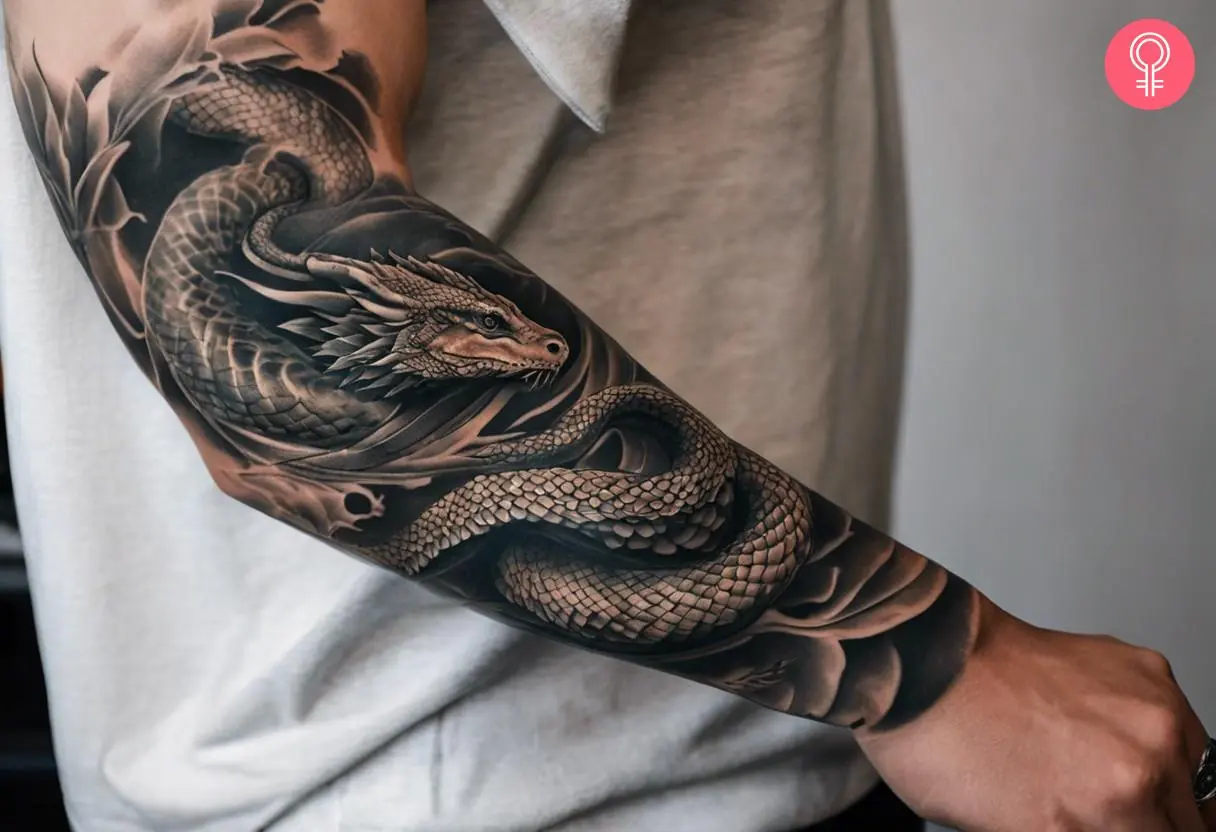 Jormungandr sleeve tattoo on the arm